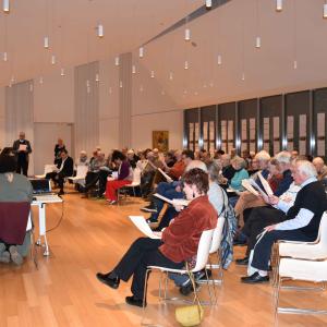 Ambassadeurs zaal zingt